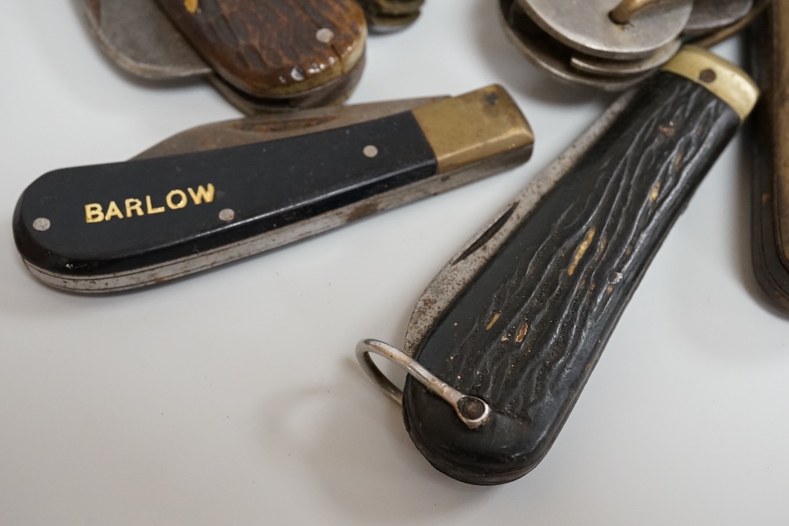 A collection of assorted penknives and whistles